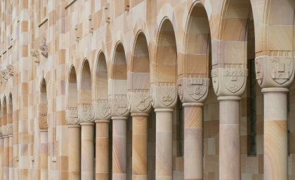 Closeup of UQ's cloister columns with the carvings visible